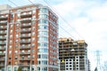 Construction and modern condo buildings with huge windows and balconies in Montreal Royalty Free Stock Photo