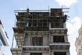 construction of a multi-storey building by a team of builders in city