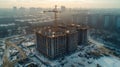 Construction of a multi-storey building in winter. Aerial view Royalty Free Stock Photo