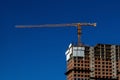 Crane machine above the new building.