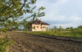 Construction of new brick family house in suburbs. Shell of town home with completed walls and roof. Building a home Royalty Free Stock Photo