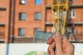 Construction of a new building or a new skyscraper.Construction site.Hands holding the keys to a new home.Mortgage for the