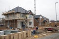 Construction of new house in progress at building site Royalty Free Stock Photo