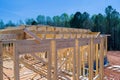 During construction of a new house, there are beams of wood framing to use as a framework Royalty Free Stock Photo