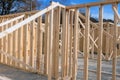 Construction of a new house under construction using wood framing beams