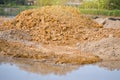 construction of the new house in the village. heap of dirt soil Royalty Free Stock Photo