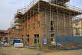 Construction of new houses with scaffolding Royalty Free Stock Photo