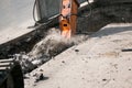 Construction of a new multi-storey building. The work of a jackhammer when laying the foundation