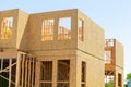 construction of a new plywood house frame walls wood sky build Royalty Free Stock Photo