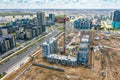 Construction of new residential area. aerial view of construction site, working construction crane and new buildings