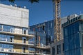 Construction of a new residential complex. High-rise building at a construction site on a sunny day. June 2020. Kiev