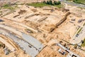 Construction of new road, aerial top view. construction machine working at construction site Royalty Free Stock Photo