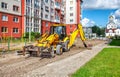 Construction of a new road. excavator prepares the surface Royalty Free Stock Photo