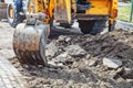 Construction of a new road. excavator prepares the surface Royalty Free Stock Photo