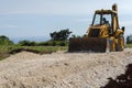 Tractor Leveling Marl On Road Construction Site