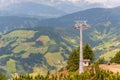 Construction of a new ski lift. Support pole, no steel ropes, standing alone on the slope. Upper ski lift station. Royalty Free Stock Photo