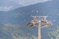 Construction of a new ski lift. Support pole, no steel ropes, standing alone on the slope. Royalty Free Stock Photo