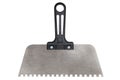 Construction notched trowel isolated on white Royalty Free Stock Photo