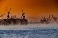 The construction of nuclear icebreakers at magic sunset, cranes of of the Baltic shipyard in a frosty winter day, steam