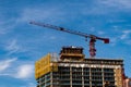 construction od building. industrial crane at construction site. architecture. constructing skyscraper. construction Royalty Free Stock Photo