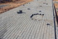 Construction of pavement near the house. Bricklayer places concrete paving stone blocks for building up a Sidewalk pavement