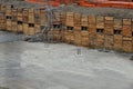 Construction pit where underground garages are being built. wooden excavation sheeting and securing the walls with help of ground Royalty Free Stock Photo