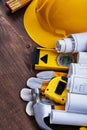 Construction plans and group of building tools on Royalty Free Stock Photo