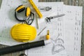 Construction plans with helmet and drawing tools on blueprints . Royalty Free Stock Photo