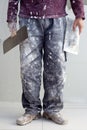 Construction plaster plaster man dirty trousers Royalty Free Stock Photo