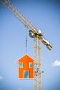 The construction of a prefabricated house - concept image Royalty Free Stock Photo