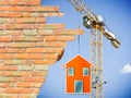 The construction of a prefabricated house - concept image Royalty Free Stock Photo