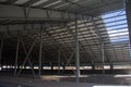 Construction of a prefabricated house. Steel frame of the building and insulating panels for the lectern. The use of modern