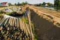 Construction of a floodbank or levee along a river