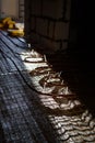 The construction process - floor screed using a metal grid and laying pipes for Underfloor heating. Royalty Free Stock Photo