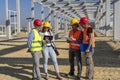 Construction Project Manager And His Team Discuss A Project On Construction Site Royalty Free Stock Photo