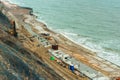 Construction of the promenade by the sea, construction equipment on the beach Royalty Free Stock Photo