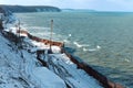 Construction of the promenade at sea, strengthening the sea coastline, special equipment on the beach Royalty Free Stock Photo