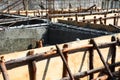 Construction of steel beams and plastering for building foundations Royalty Free Stock Photo