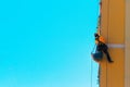 Construction and renovation background. Worker climbing on the wall Royalty Free Stock Photo