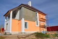 Construction or repair of the rural house with balcon, eaves, windows, chimney, roofing, fixing facade, insulation and painting