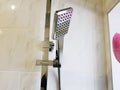 Construction and repair - shower in the bathroom on a chrome pipe