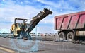 Construction road repair concept asphalt cutting using sensors and artificial intelligence data analysis for construction