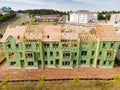 Construction of a roof on a new three-storey wooden building