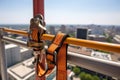 Construction safety equipment for work at height, safety harness and seat belt closeup. Generative AI Royalty Free Stock Photo