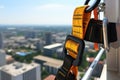 Construction safety equipment for work at height, safety harness and seat belt closeup. Generative AI Royalty Free Stock Photo