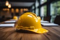 Construction safety Yellow helmet positioned on a table for workers