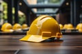 Construction safety Yellow helmet positioned on a table for workers