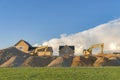 Construction sand piles with two excavators at Utah