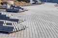 Construction of sidewalk with cobblestones Royalty Free Stock Photo