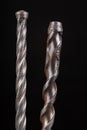 Construction sintered carbide drills damaged. Worn out tools for builders Royalty Free Stock Photo